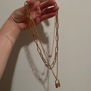 NWT triple layered necklace.